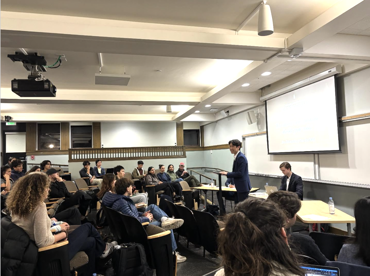 Students talking at a club meeting